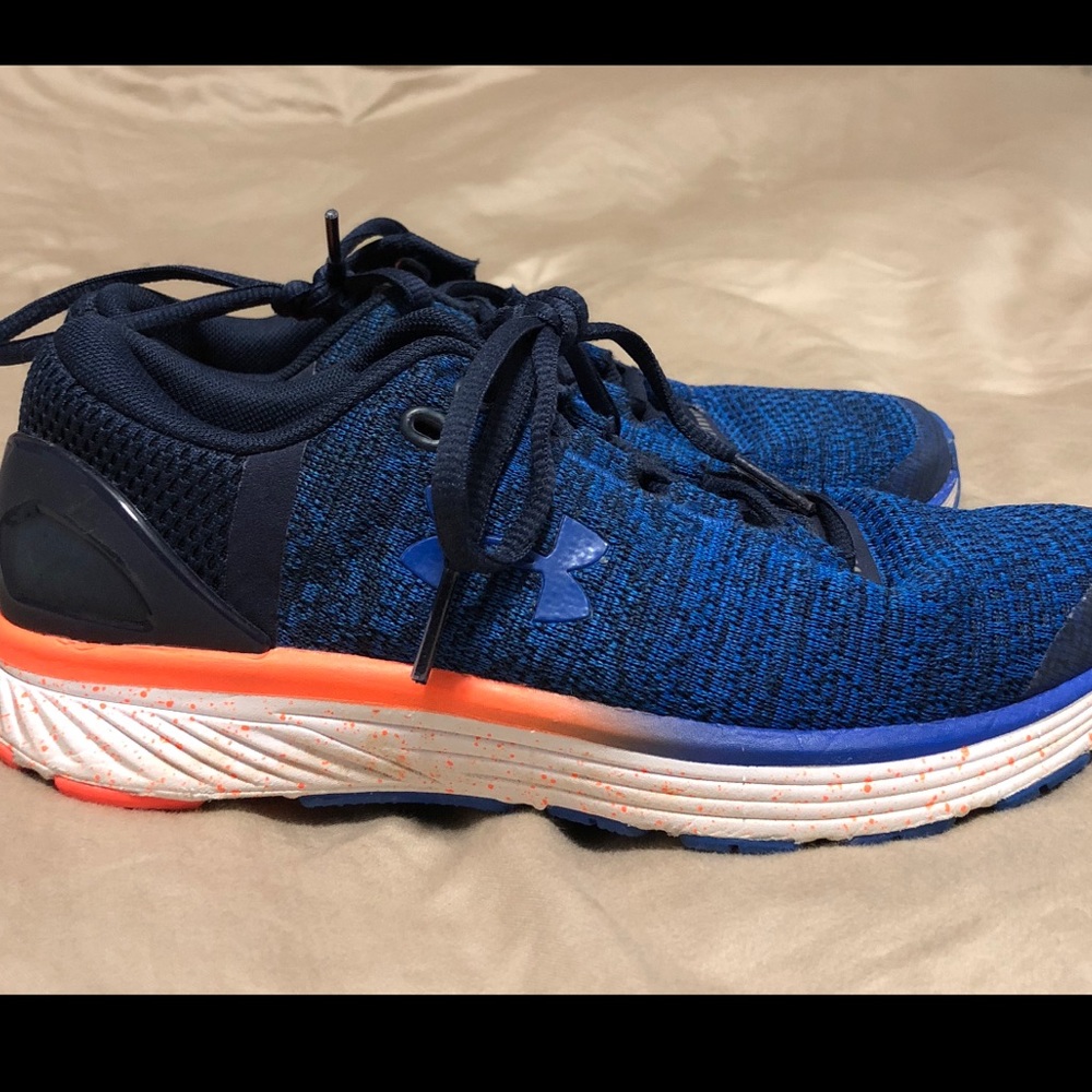 Size 4, boy’s Under Armour Athletic Shoes